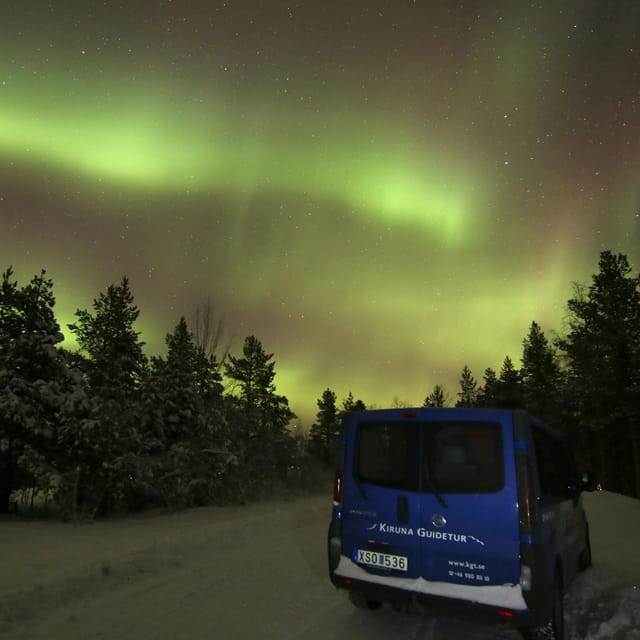 Kiruna: Northern Lights Minivan Chase with Warm Drink - Meeting behind Scandic Hotel in central Kiruna