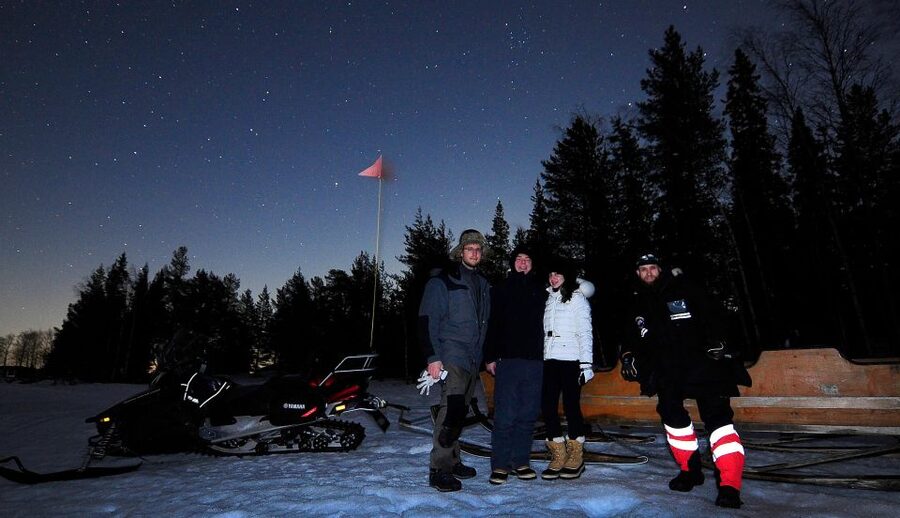Luleå : Northern Lights Tour on a Snowmobile drawn Sled - Settling into a sled built for the cold