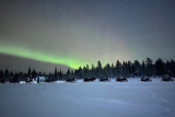 Northern Light snowmobile tour in Kiruna 7:30 pm - Riding through the trees and across snowy routes