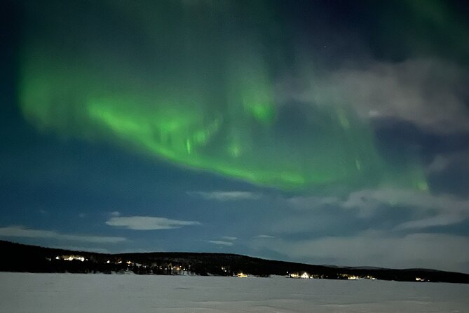 Northern Light snowmobile tour in Kiruna 7:30 pm - Jukkasjärvi church and a quieter side of the region