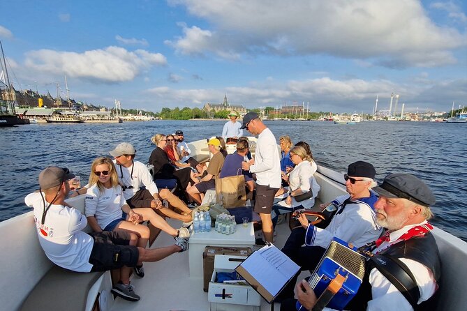 Open Electric Boat Ride in Stockholm with Live-Guide - Boarding at Skeppsbron beside the Gustav III Statue
