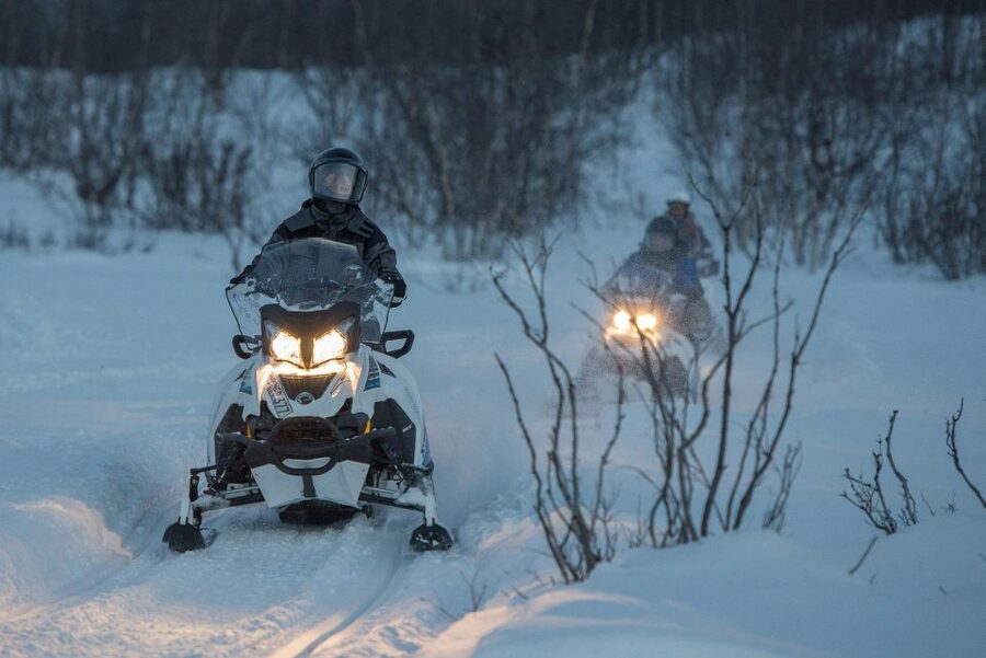Snowmobile Adventure Abisko (Shared) - Snowmobile riding in Abisko’s Arctic setting