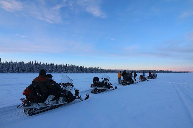Snowmobile Arctic Adventure - Lunch by the fire in a wooden hut