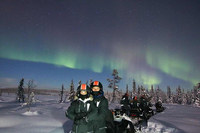 Snowmobile Aurora Expedition with dinner - Sharing a snowmobile across the frozen north