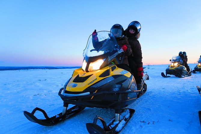Snowmobile Safari to Lapland viewpoint - Arctic clothing makes the cold easier to manage
