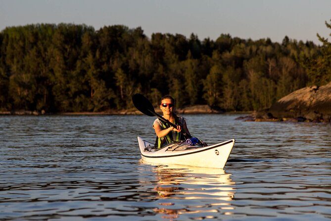 Stockholm Archipelago Sunset Kayaking and Fika tour - Getting comfortable in a sea kayak