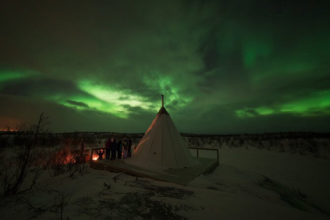 The Ultimate Aurora Photo Adventure - Warmth, snacks, and waiting beside the fire