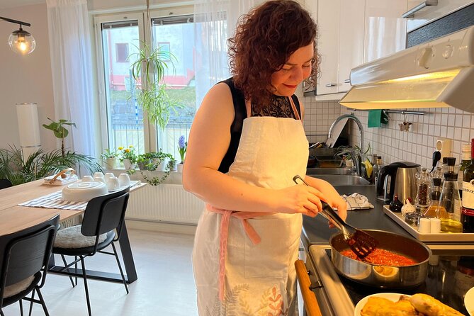 Traditional Persian Cooking Class in Stockholm with a Local - Sitting down to barberry rice, eggplant, and salad